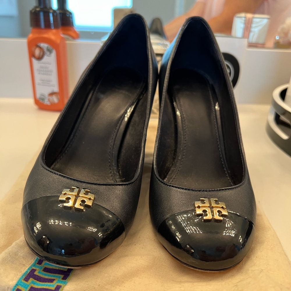 Tory Burch Navy Blue size 7 1/2 wedge heels. Gently used in great condition.